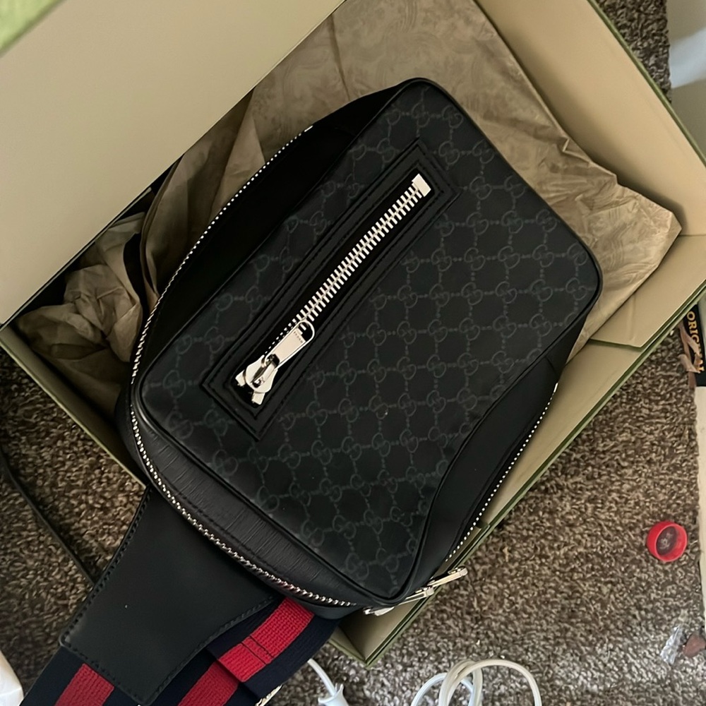 Over shoulder GG black sling BackPack